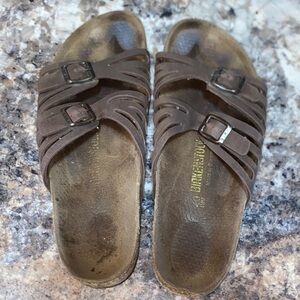 Birkenstock Dark Brown Slide Sandals  loved and worn down